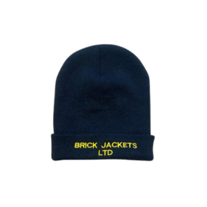 A knitted navy beanie hat with yellow embroidered text saying Brick Jackets Limited